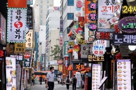 Shop for fashion and K-beauty products in Seoul’s vibrant districts.