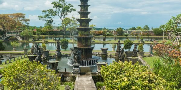 Tirtagangga water palace with fountains and ponds on Bali, Indonesia